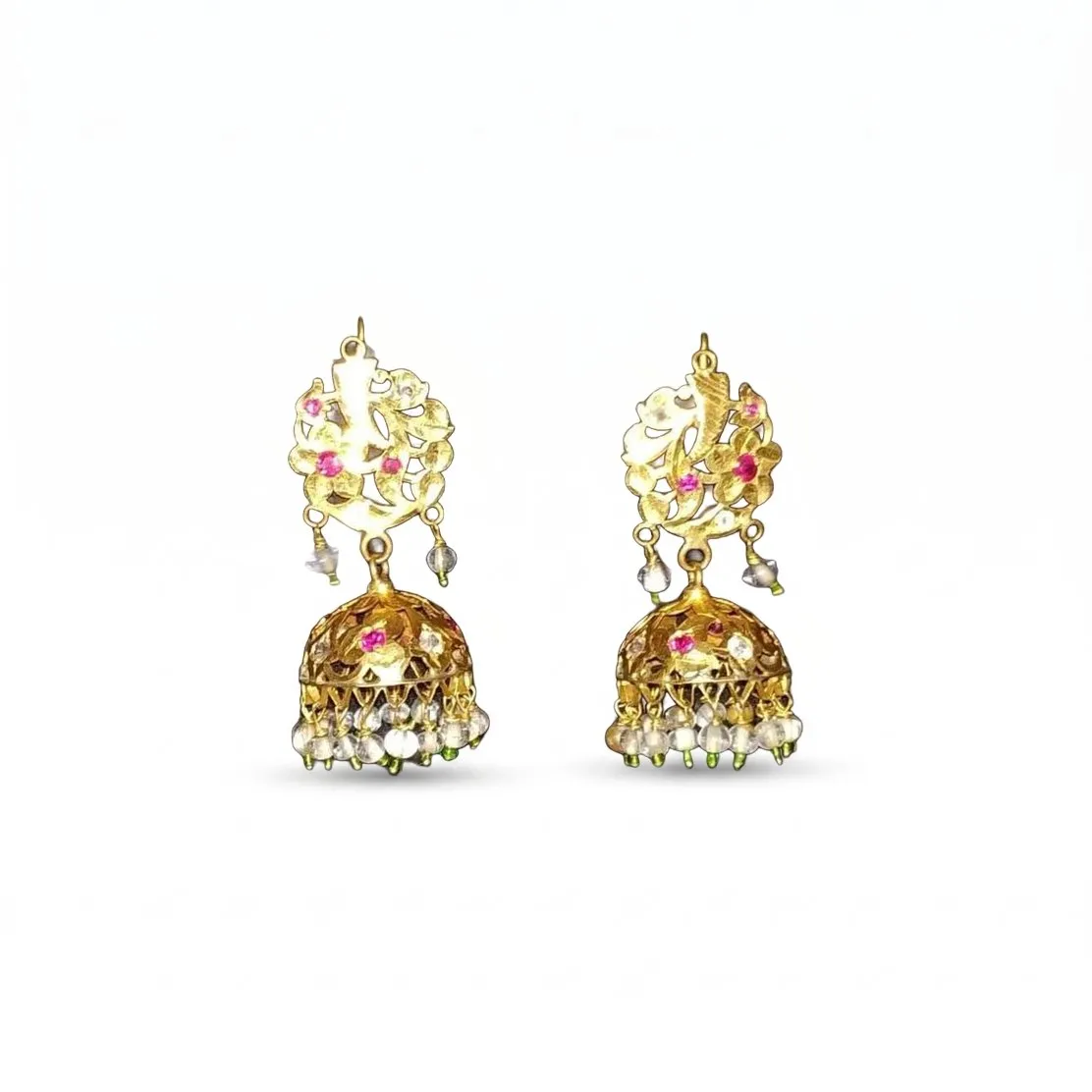 Pair of gold jhumkas with red and green stones on a pure white background with a soft shadow